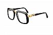 Styl třpytivý – brýle Cazal – kombinace zlaté a černé ve tvarově nezvyklé, tj. téměř čtvercové obrubě